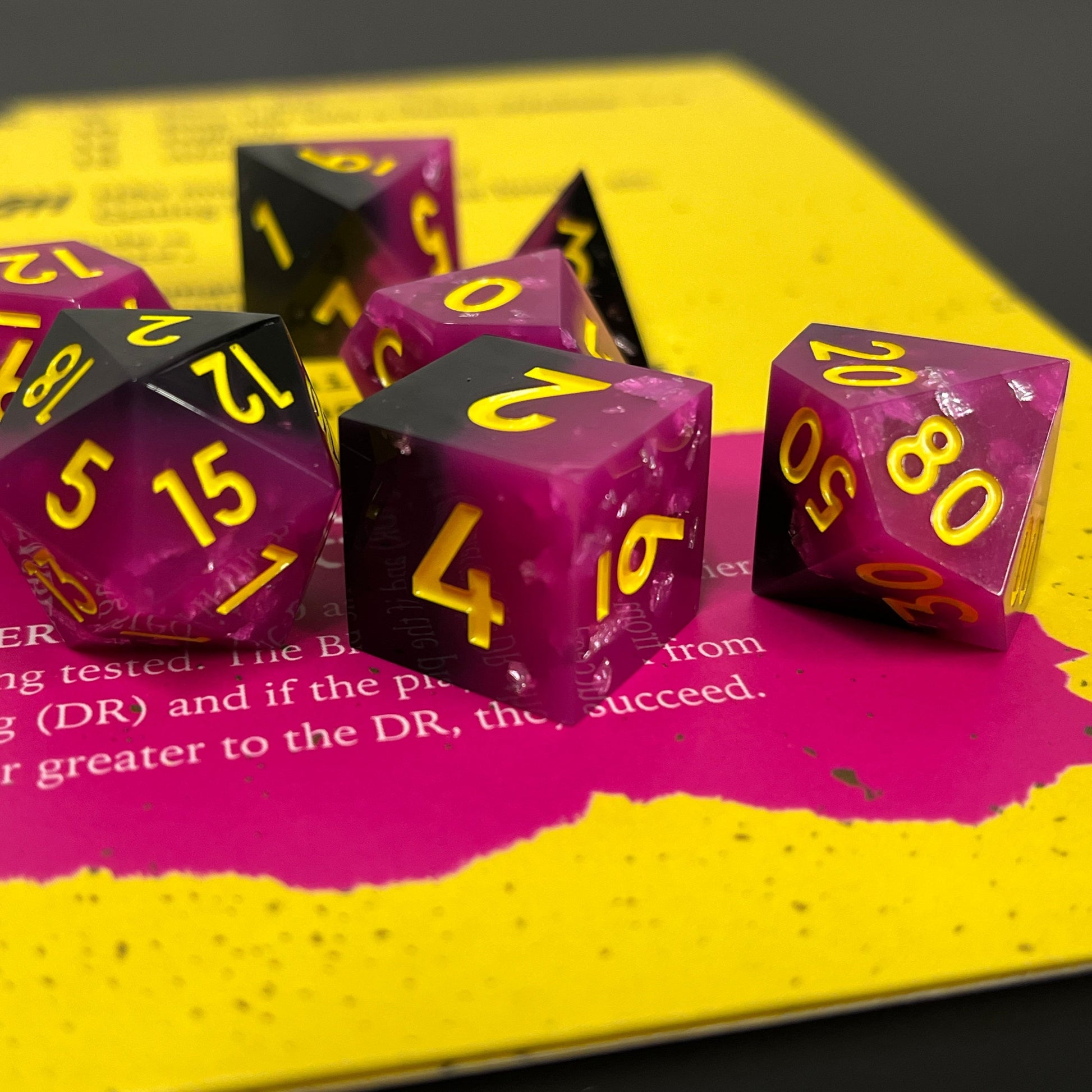 Punk Is Dead DND sharp edge dice, vibrant hot pink, black finished with neon yellow fonts for a music RPG