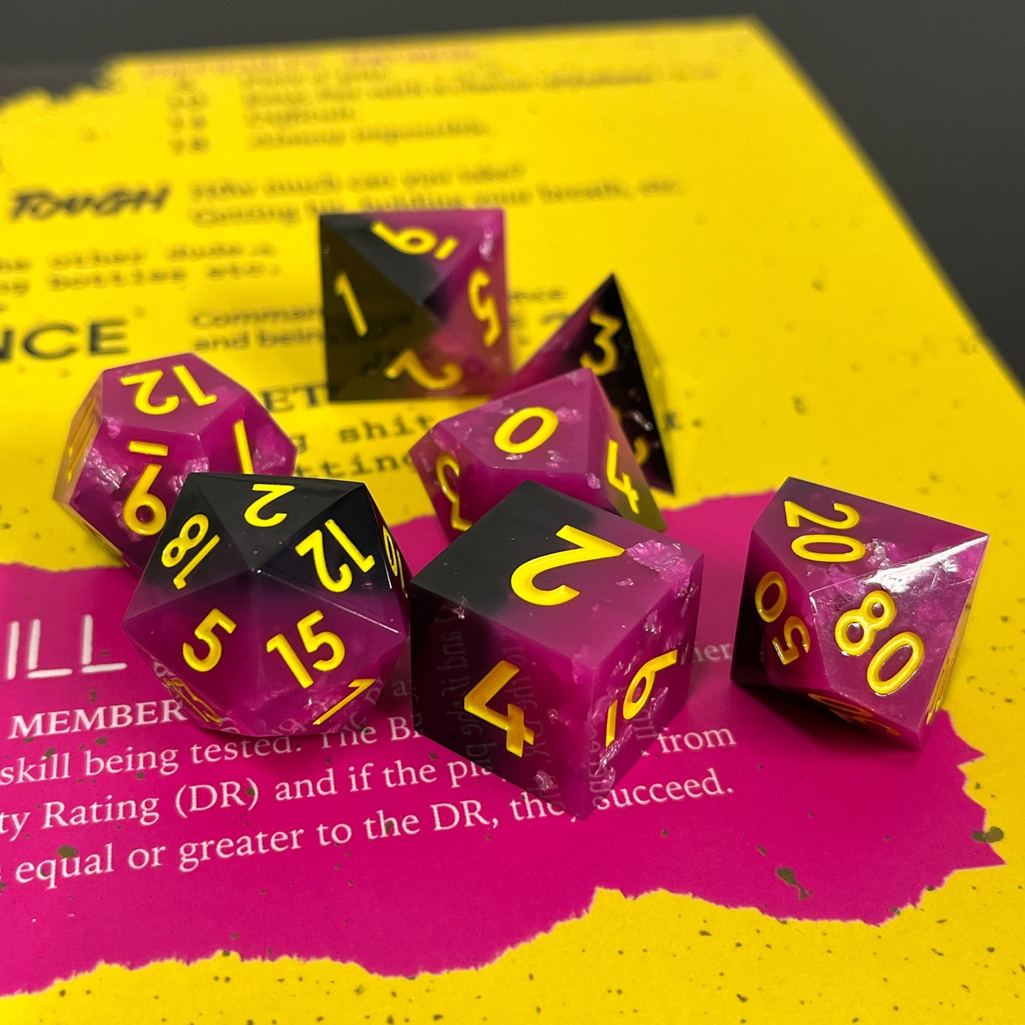 Punk Is Dead DND sharp edge dice, vibrant hot pink, black finished with neon yellow fonts for a music RPG